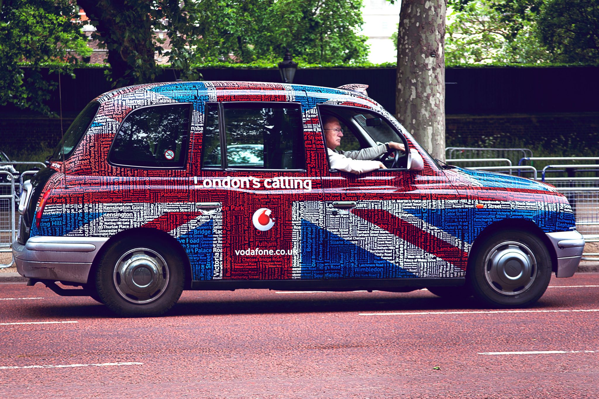 Wrapped London black cab used for taxi advertising