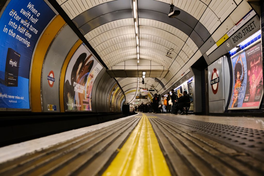 Advertising panels on the platform at Bond Street Underground station