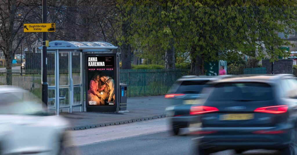 Bus shelter advertising seen by passengers and passing traffic