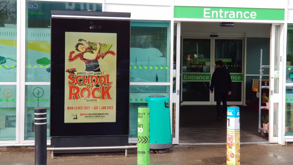 Place-based advertising campaign near a community retail setting